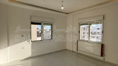 شقة - خلف أسواق شونيزقرب مستشفى تلاع العلي - 125000 دأ